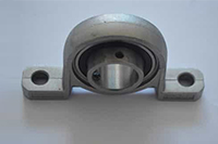 Zinc alloy bearing with seat